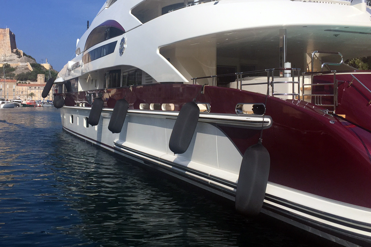 Black Fendertex fenders on mega yacht