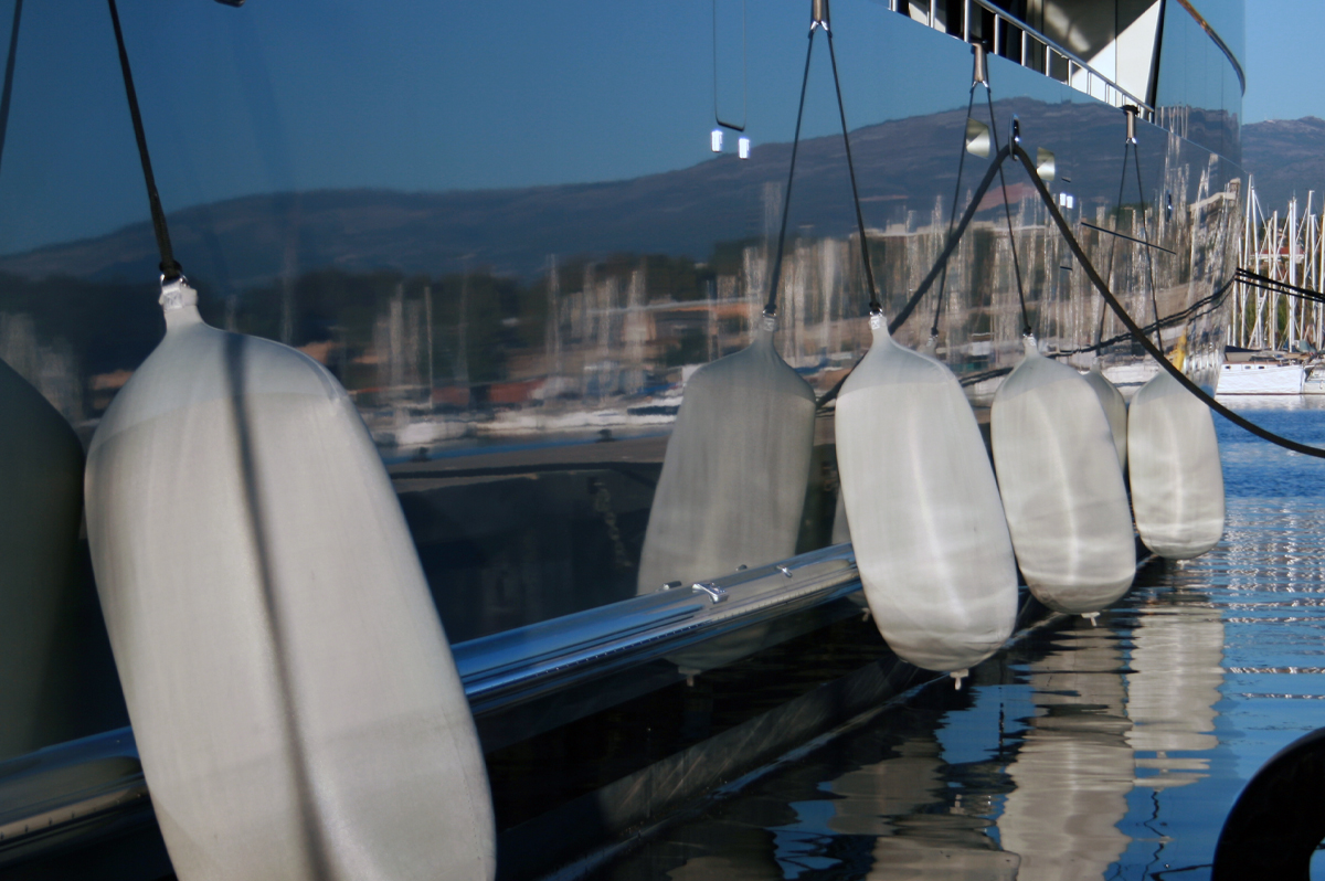 Grey Fendertex fenders on mega yacht