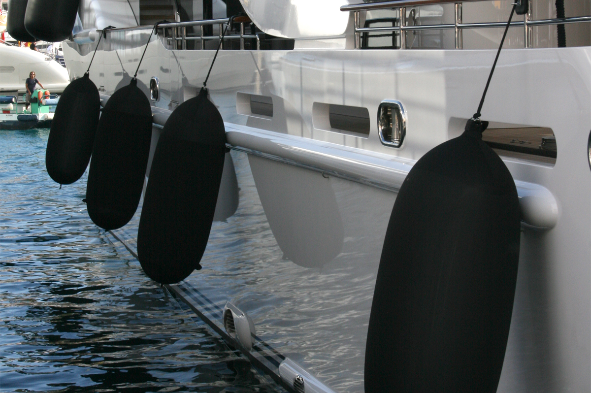Black Fendertex fenders on mega yacht