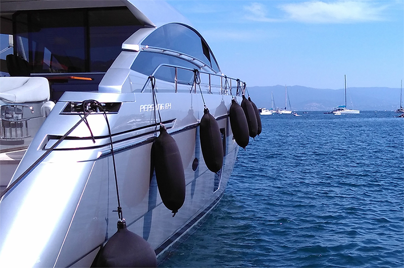 Black Fendertex fenders on powerboat