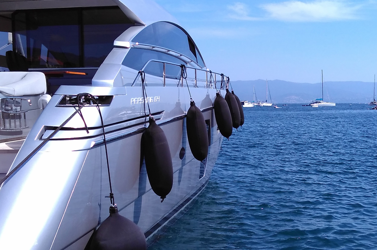 Black Fendertex fenders on powerboat