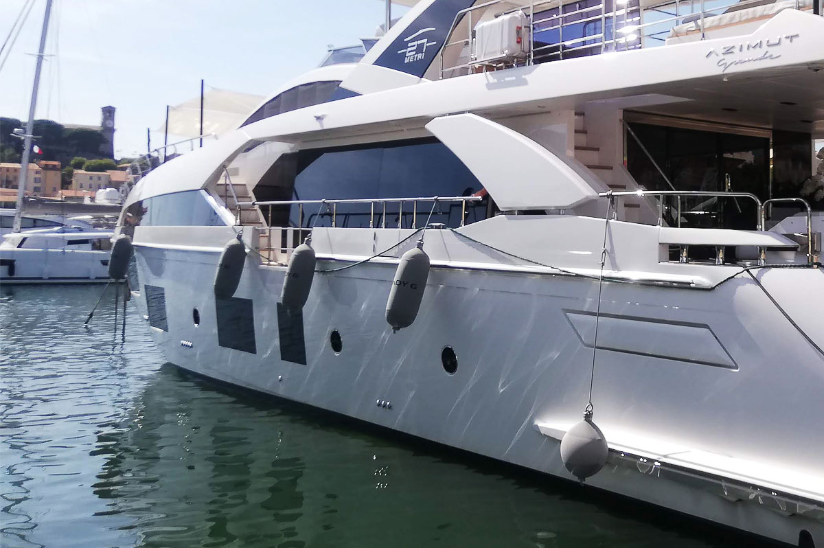 Custom gray Fendertex fenders on powerboat