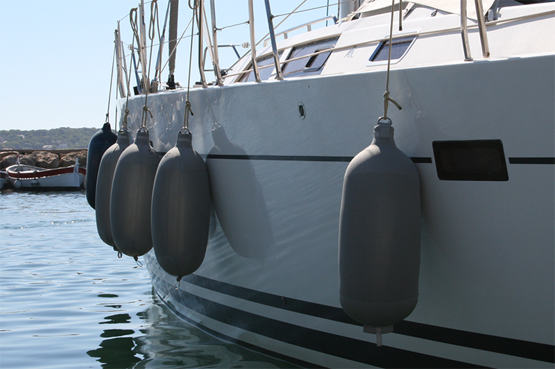 Grey Fendertex fenders on sailboat