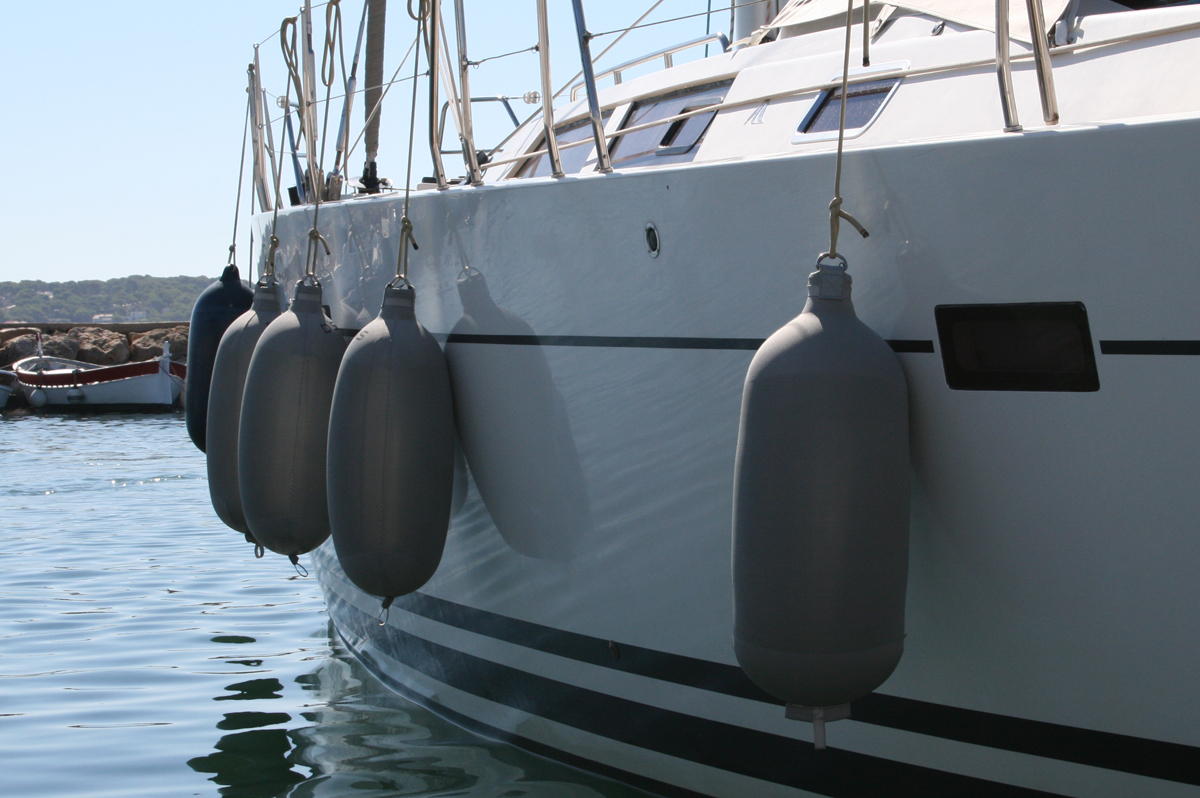 Grey Fendertex fenders on sailboat
