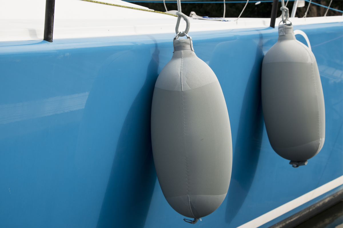 Grey Fendertex fenders on sailboat