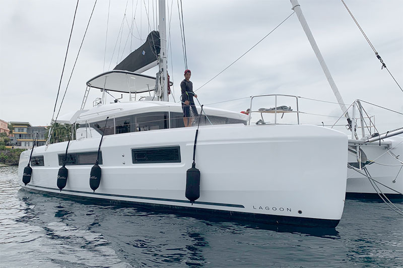 Custom black Fendertex Fenders on a Lagoon catamaran